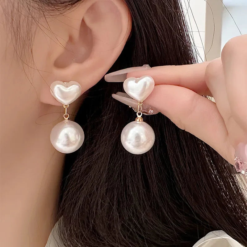 Heart Shaped Pearl Clip On Earrings