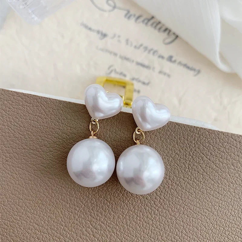 Heart Shaped Pearl Clip On Earrings