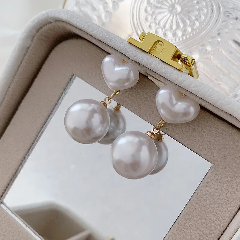 Heart Shaped Pearl Clip On Earrings
