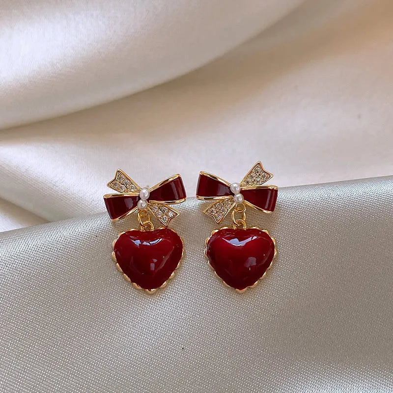 Red Hearts Clip On Earrings