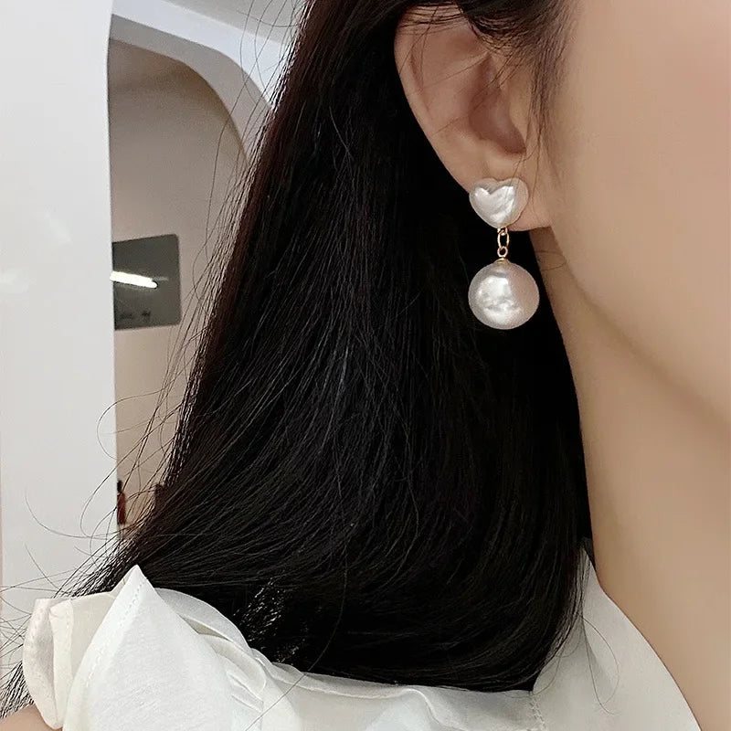 Heart Shaped Pearl Clip On Earrings
